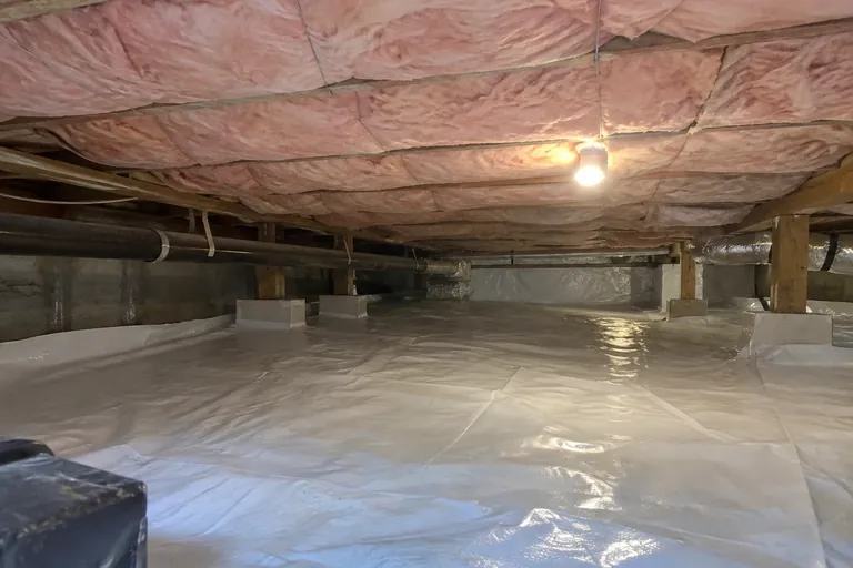 Crawl space insulation installation