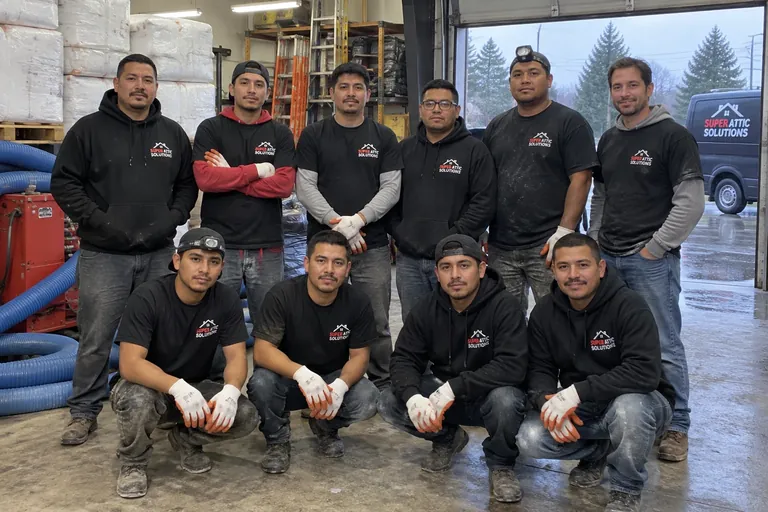 The full Super Attic Solutions crew at the shop